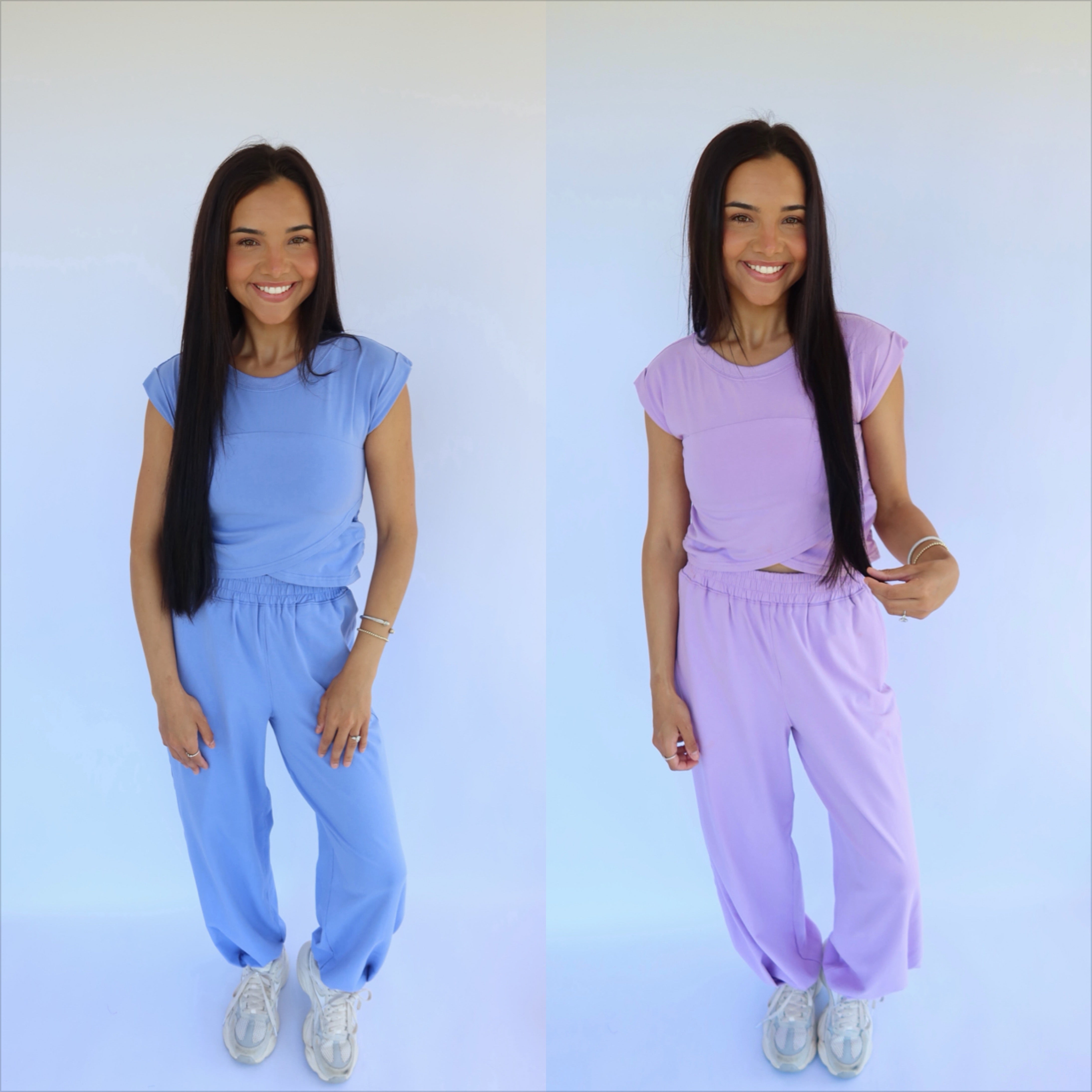 Two women wearing matching blue and lavender outfits against a white background